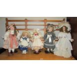 5 porcelain dolls