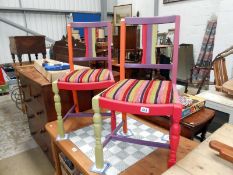 A pair of painted & newly upholstered chairs