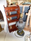 Victorian spelter oil lamp converted to electric and a small mahogany shelf unit