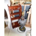 Victorian spelter oil lamp converted to electric and a small mahogany shelf unit