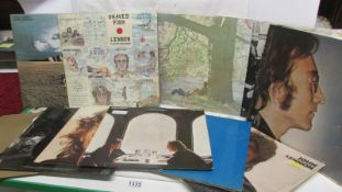 A collection of 15John Lennon albums plus all inserts including Wedding album box set,