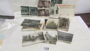 In excess of 20 WW1 related postcards including Bombardment of Ypres, Lille and Rheims,