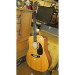 A tanglewood acoustic guitar