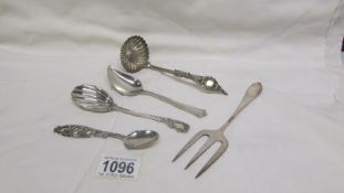 A mixed lot of silver cutlery including sifter spoon