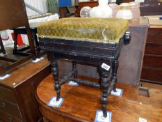 An Edwardian adjustable piano stool