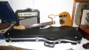 A Squire B4 Fender electric guitar in hard case and a new boxed Equiphone Snakepit 15G amplifier