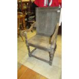 An antique elbow chair