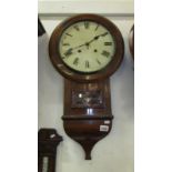 A rosewood wall clock