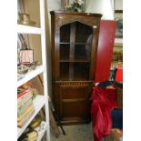 Dark oak period style corner cupboard