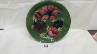 A William Moorcroft anemone shallow bowl,