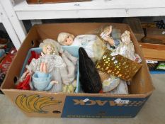 Box of vintage small plastic dolls and collectors porcelain dolls