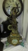 A French spelter clock, springs and feather ok,
