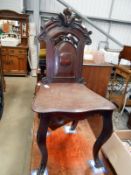 A Victorian mahogany shield back hall chair