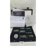 A cased set of 12 silver official coins of the United States
