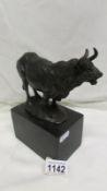 A bronze bull sculpture on marble base signed Milo and with foundry stamp