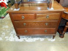 A 1930's oak 4 drawer chest of drawers