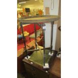 A folding brass top table