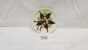 A Moorcroft Columbine pin dish with original label,