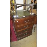 A darkwood stained 2 drawer filing cabinet with leather inet top