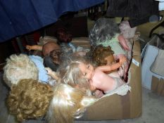 A large box of old dolls