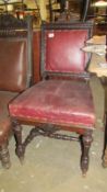 A 19th C leather oak hall chair