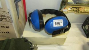 A pair of blue Bilson ear muffs