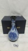 A boxed Moorcroft forget me not posy vase