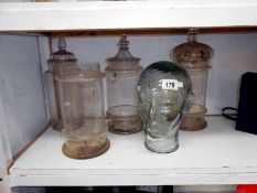 4 Victorian glass shop display jars (1 missing lid) and a glass head