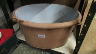 A Victorian foot bath with interior enamelling