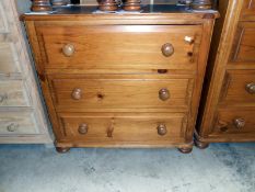 A pine 3 drawer chest of drawers