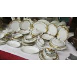 A 36 pieces Polish dinner set with gilded decoration