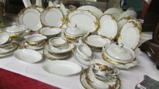 A 36 pieces Polish dinner set with gilded decoration