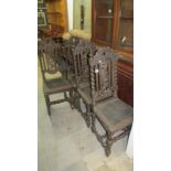 4 carved oak chairs