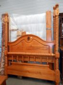 A 5ft pine 4 poster bed with mattress