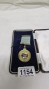 A rare silver gilt Masonic medal with porcelain 'Excalibur' plaque