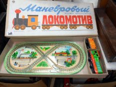 A boxed Russian tinplate clockwork train set