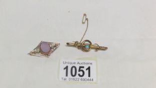 A Victorian gold brooch set opal and a Victorian brooch set blank centre and seed pearls