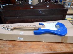 A child's Mac Smith blue electra guitar