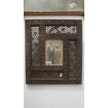 A Victorian fretwork photoframe