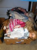 A box of collectors porcelain dolls