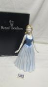 A boxed Royal Doulton figure,