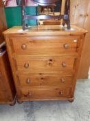 A pine 4 drawer chest of drawers