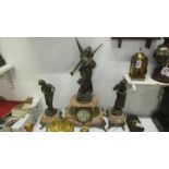 A French 3 piece clock garniture with spelter figures