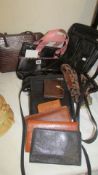 A mixed lot of handbags, wallets etc