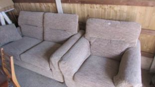 A 2 seat sofa and matching chair