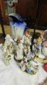 A large jug and figurines etc