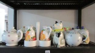 A mixed lot including teapots (one shelf)