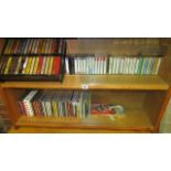 2 shelves of CD's and cassette tapes