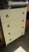 A white 4 drawer chest