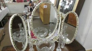 A triple dressing table mirror